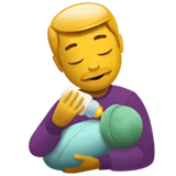 man feeding baby
