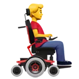 man in motorized wheelchair facing right