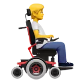 person in motorized wheelchair facing right