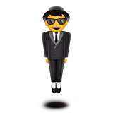 person in suit levitating
