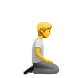 person kneeling facing right