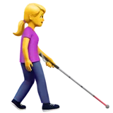 woman with white cane facing right