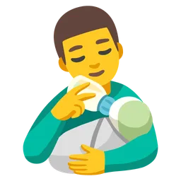 man feeding baby