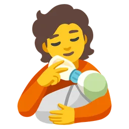 person feeding baby