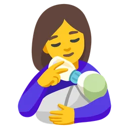 woman feeding baby