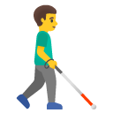 man with white cane facing right