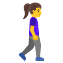 woman walking facing right