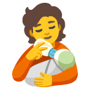 person feeding baby